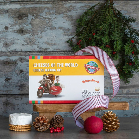 Wallace & Gromit Cheeses of the World kit with Christmas ribbon and pine cones
