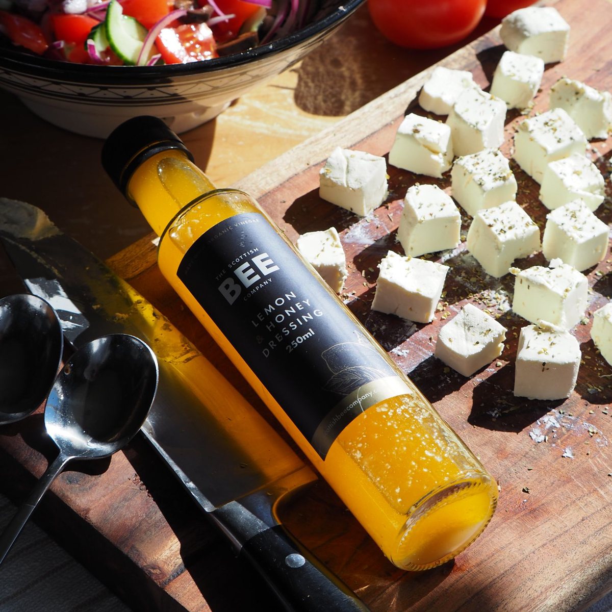 Cubes of homemade Greek style cheese with The Scottish Bee Company's lemon and honey dressing