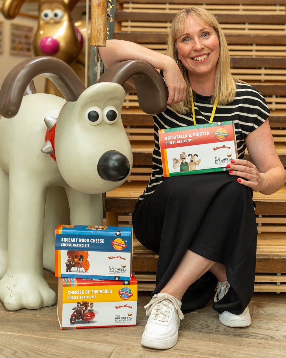 Ailsa from The Big Cheese Making Kit with a Gromit statue and the three Wallace & Gromit cheese making kits at Aardman