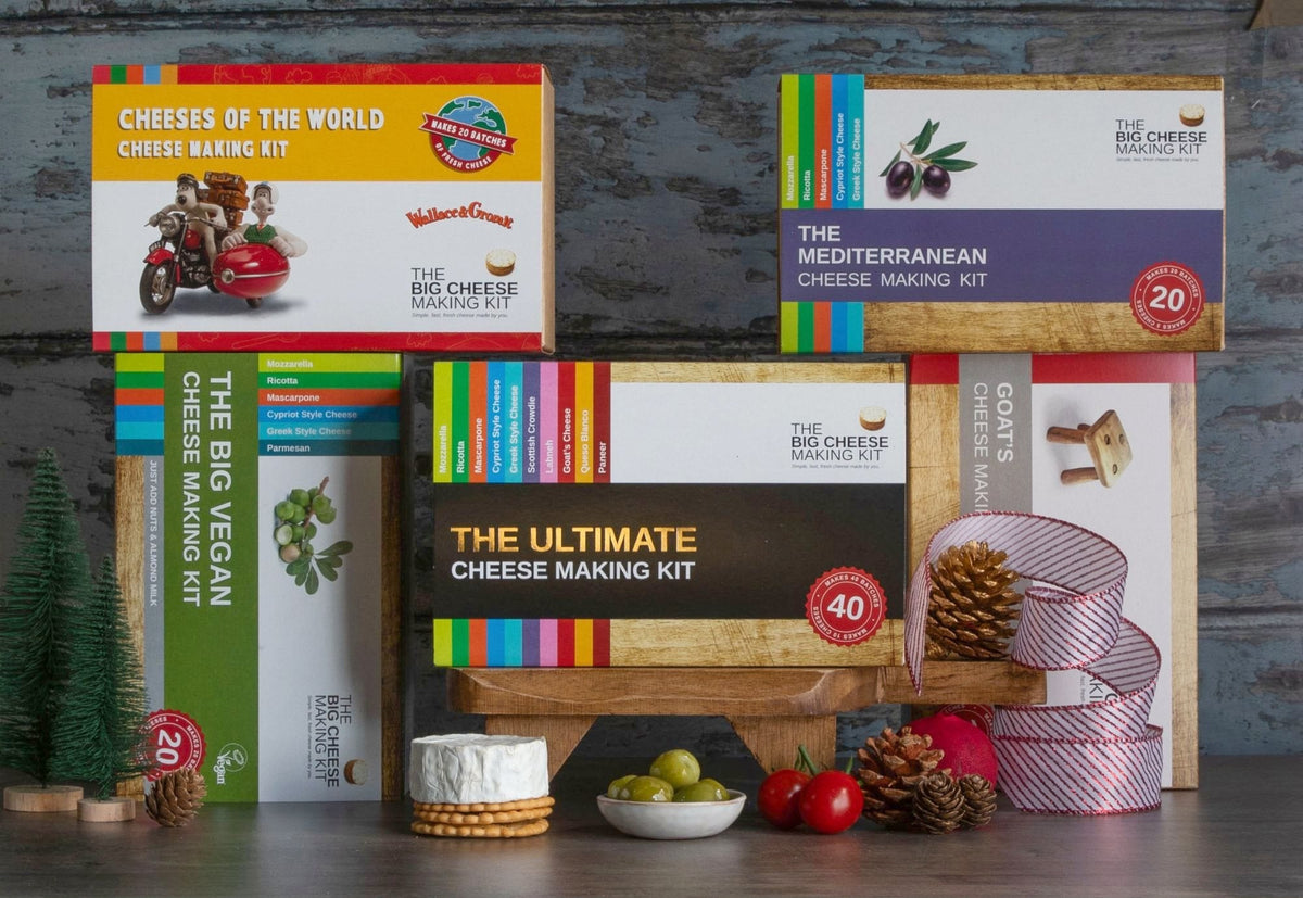 The Ultimate, Mediterranean, Big Vegan, Goat's and Wallace & Gromit kits stacked with Christmas decorations