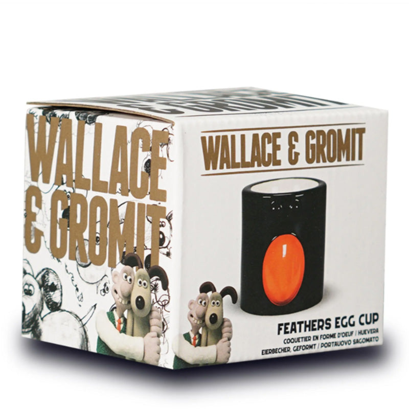 Box packaging of a Wallace & Gromit Feathers Egg Cup with cartoon characters on a white background